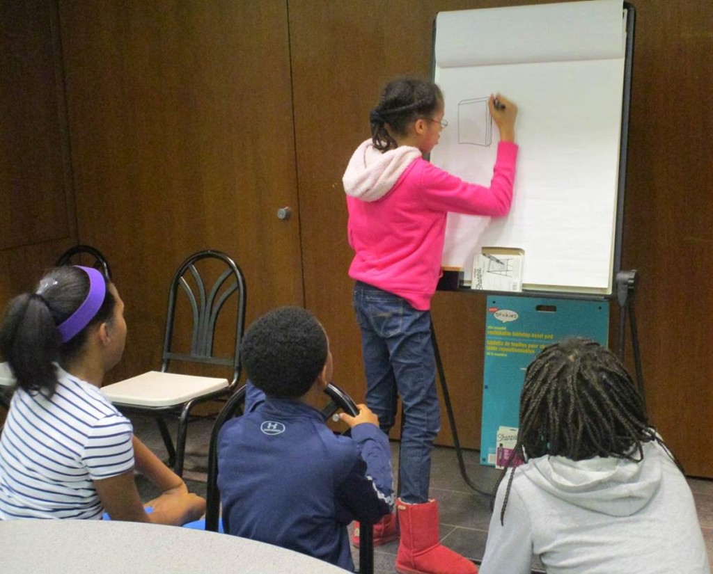 Middle school students playing Pictionary